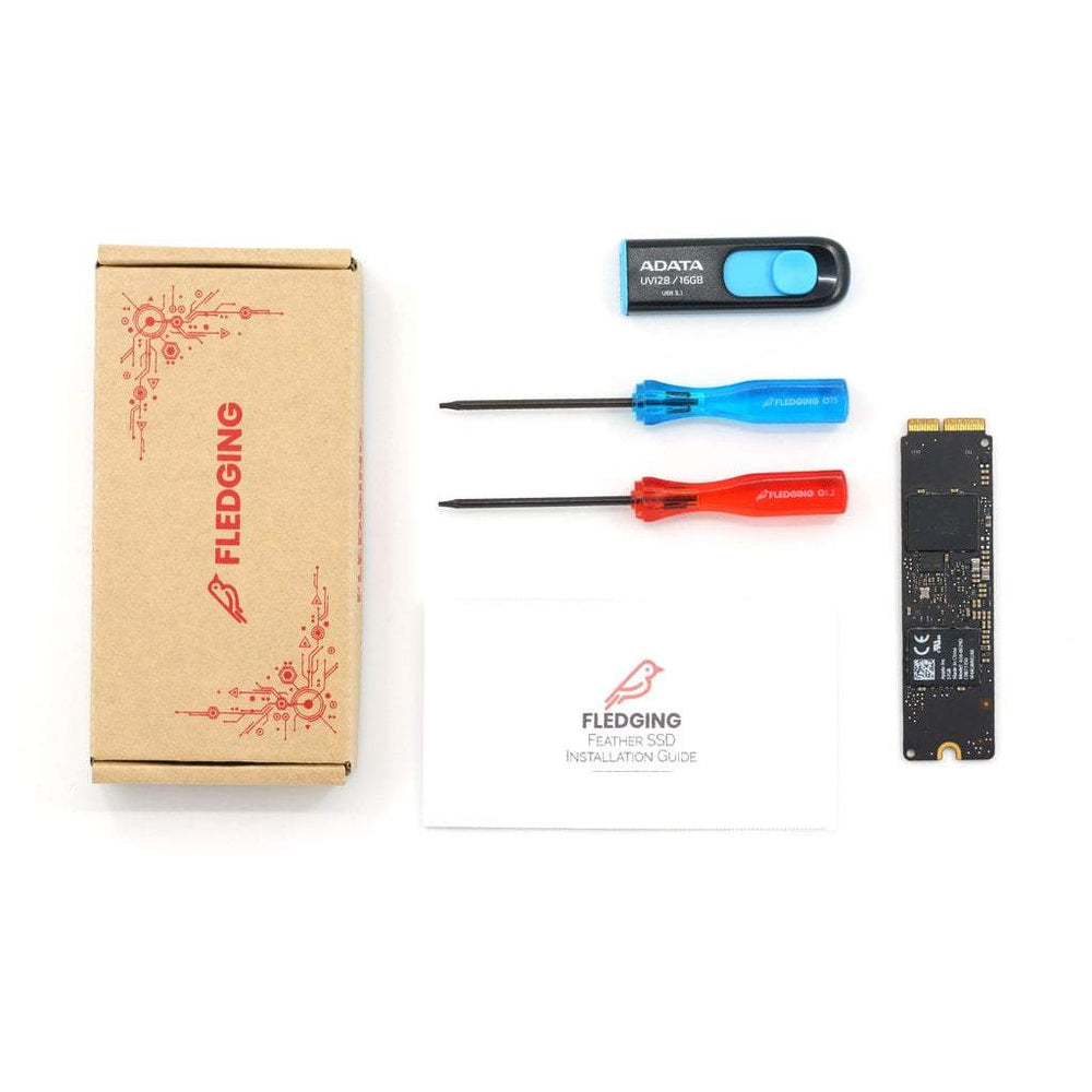 Cardboard Feather box with red accents, USB intsaller, blue T5 screwdriver, red P5 screwdriver, and instructions, Apple OEM SSD
